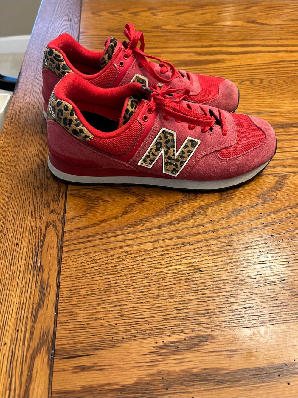 New Balance Red Sneakers with Leopard Accent